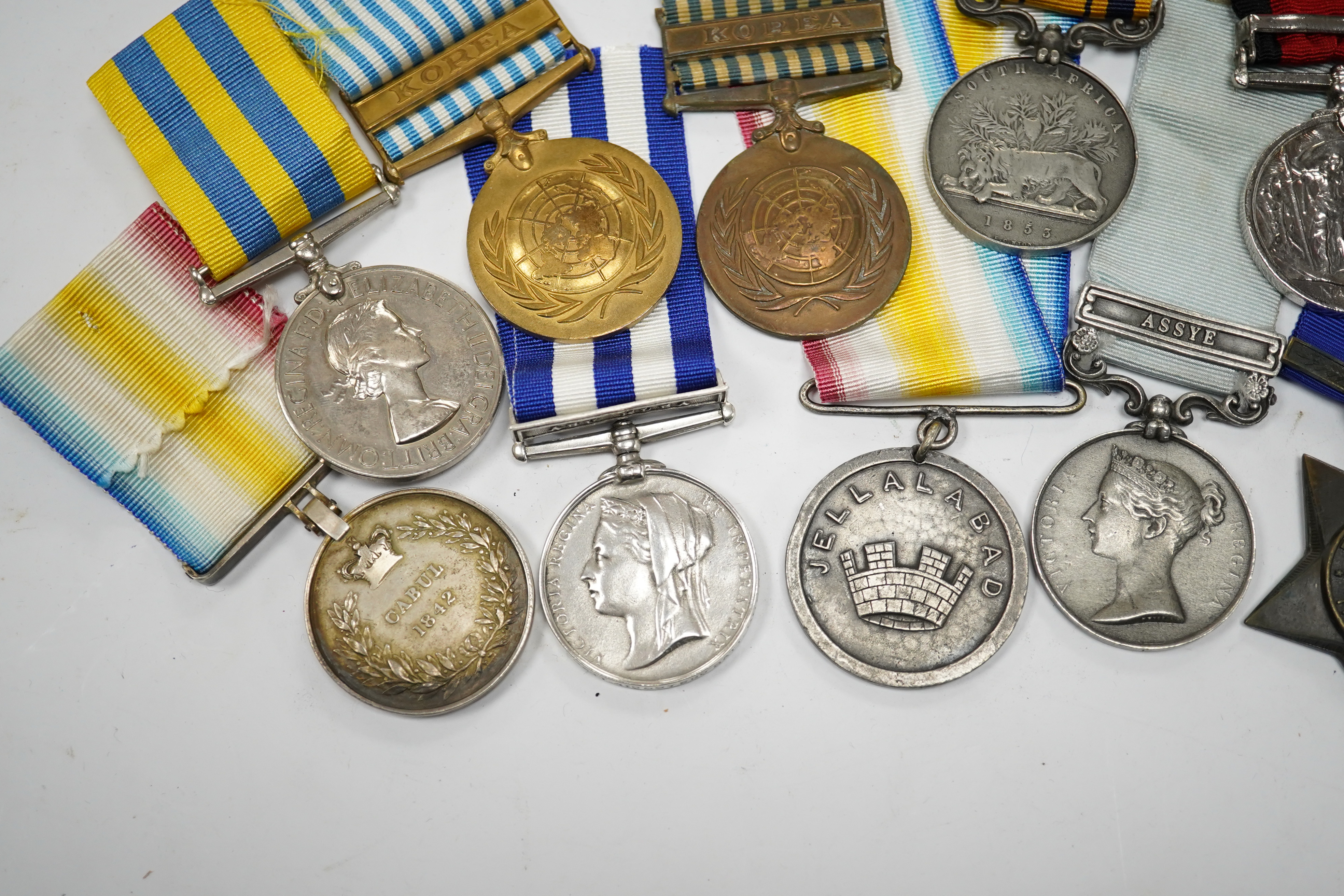 Eleven military medals, most are replica examples, etc. including